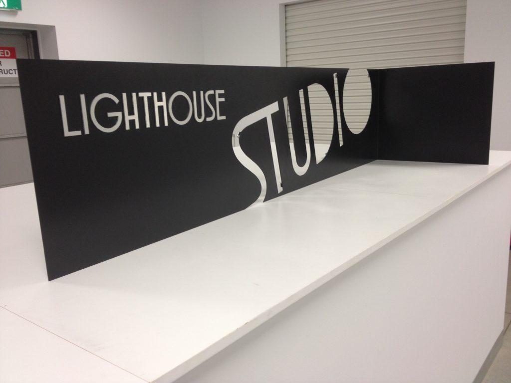 Lighthouse Studio Metal Sign