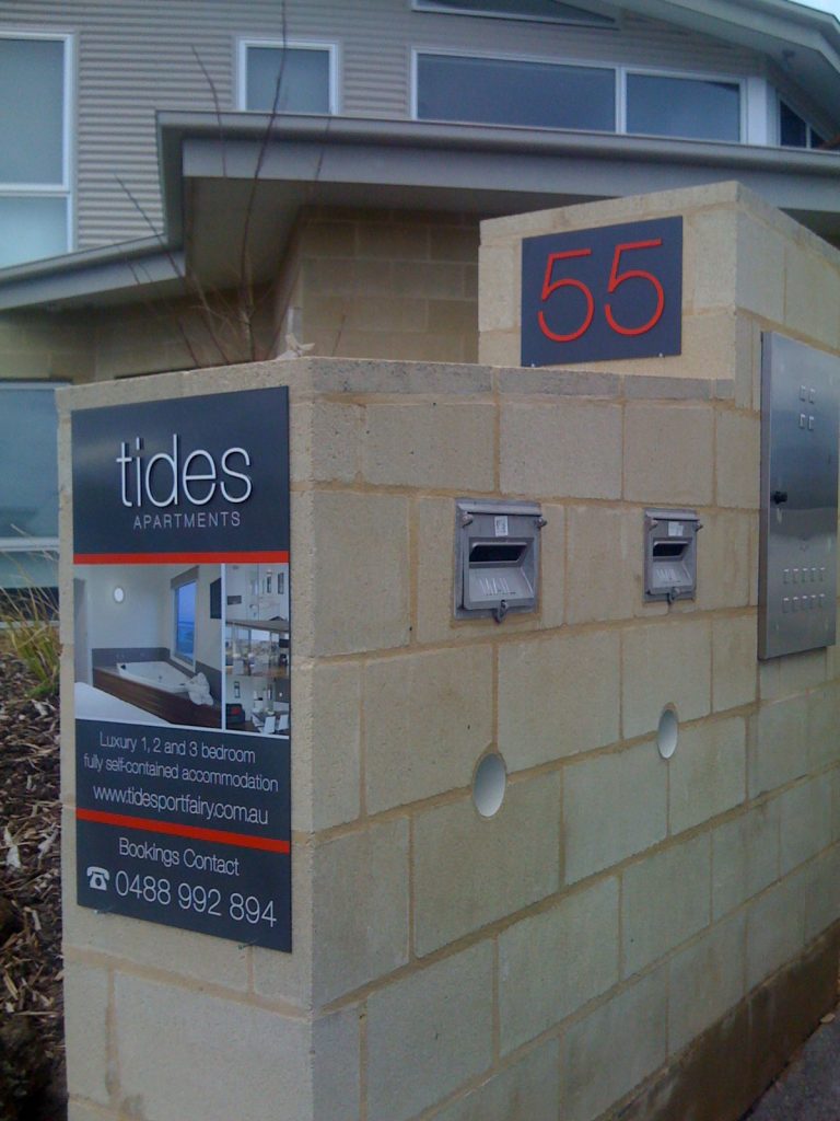 Tides Apartments Sign